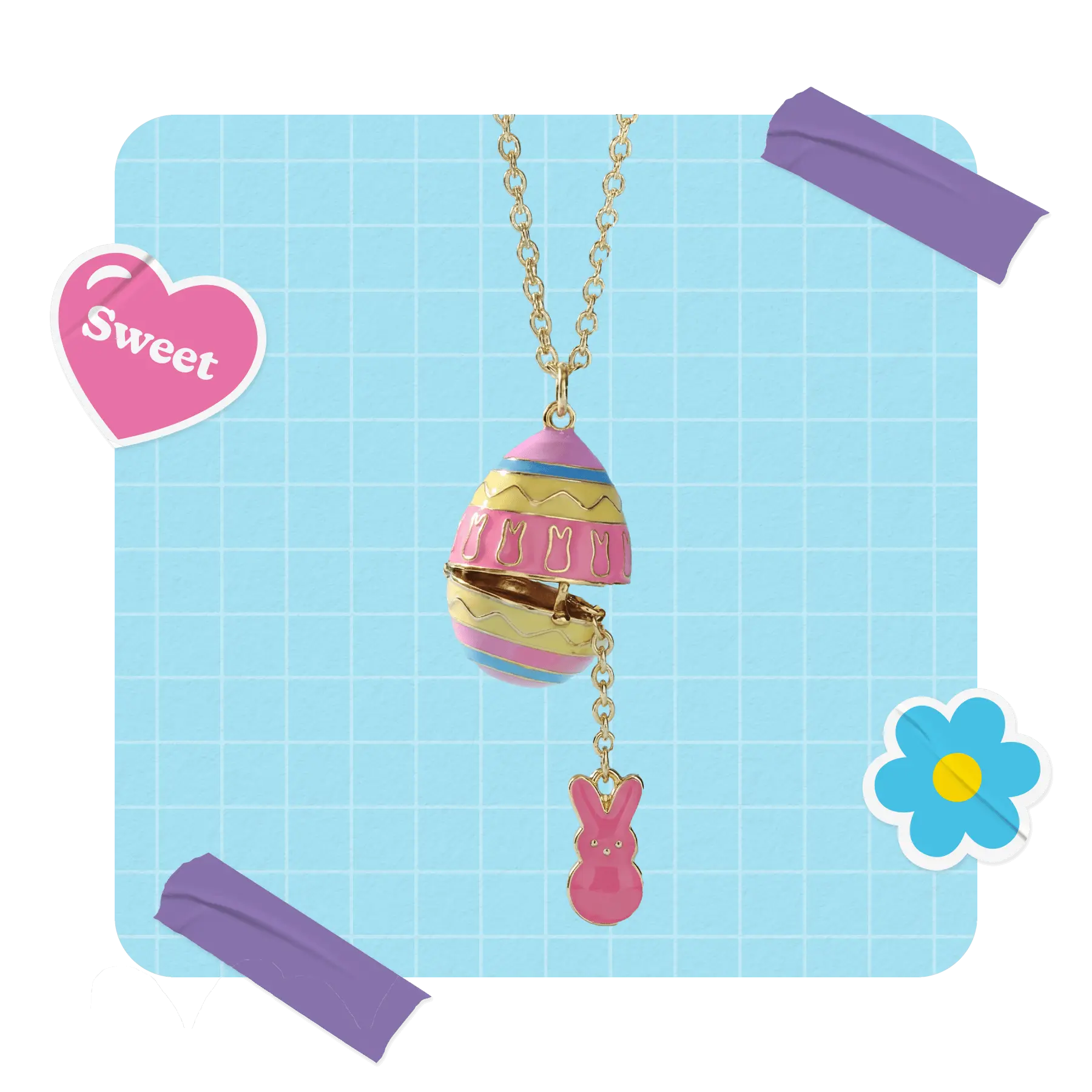 A gold chain necklace with a pink and yellow striped Easter egg pendant that opens to reveal a small pink bunny charm.